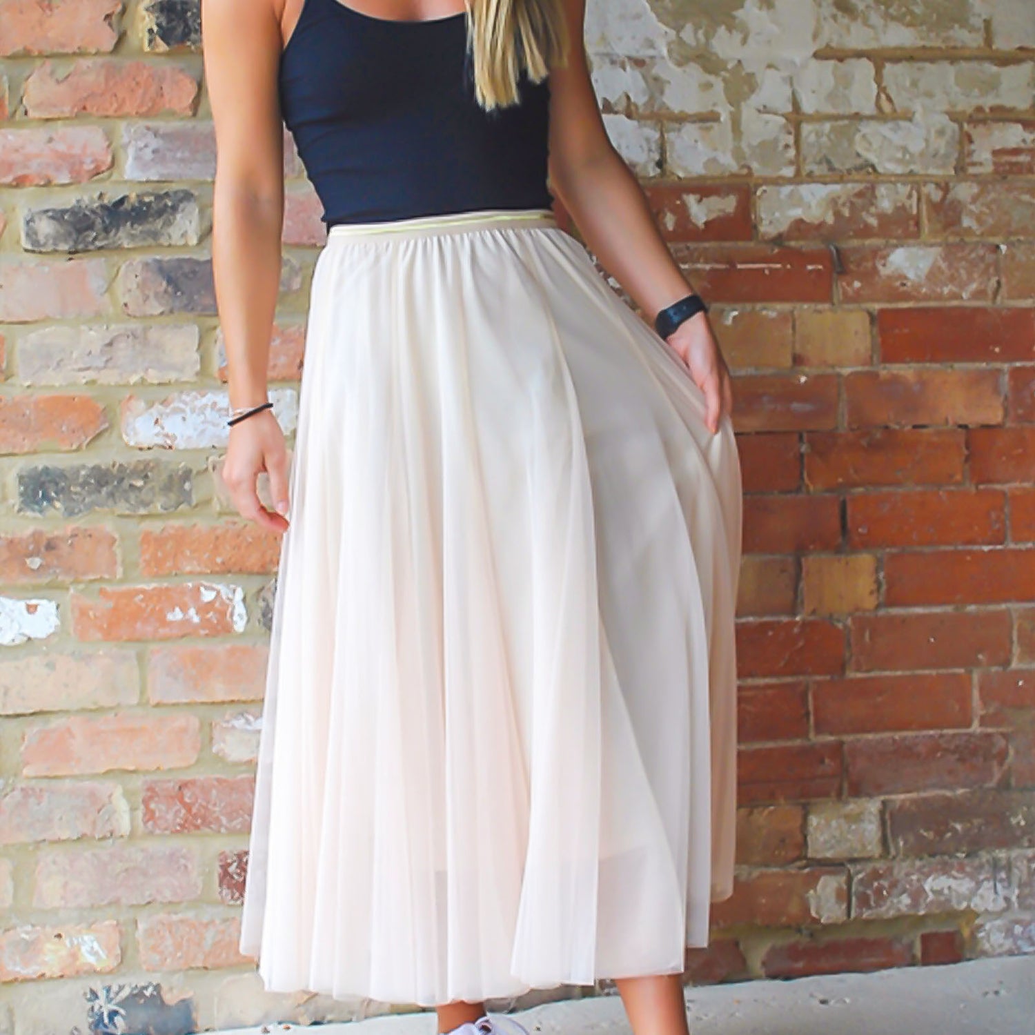 Cream Tulle layered skirt being modelled